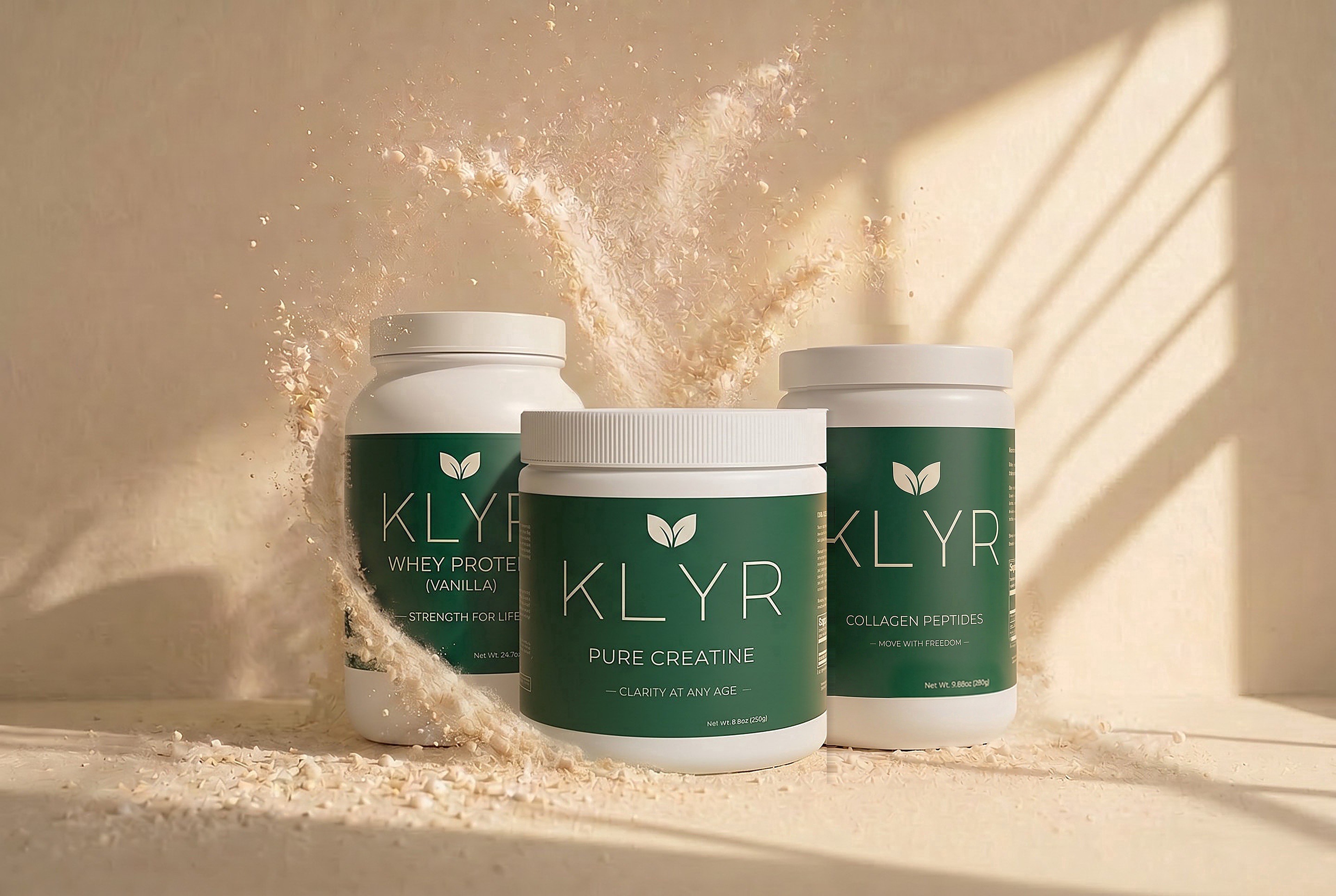 Three KLYR tubs, whey isolate, creatine, collagen, surrounded by a soft whoosh of powder